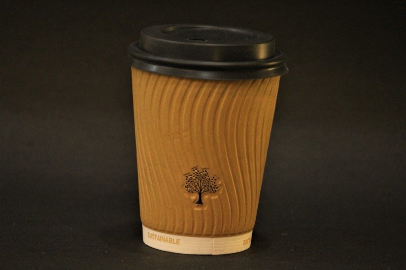 A kraft rippled cup fitted with a black sipper lid.